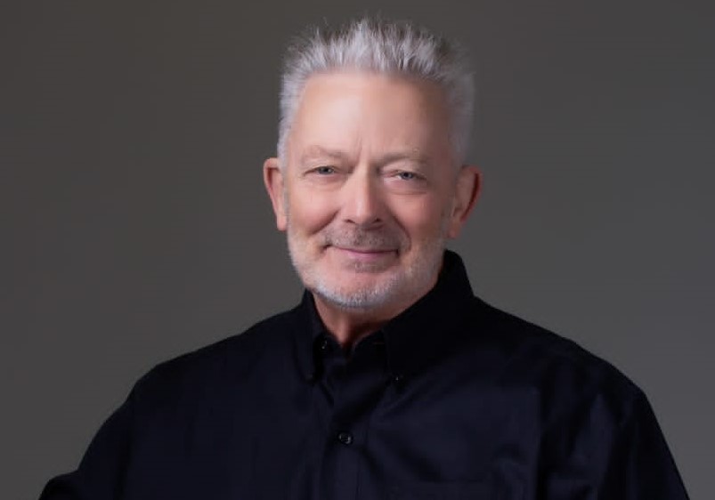 Photo of Company CEO John W Davidson